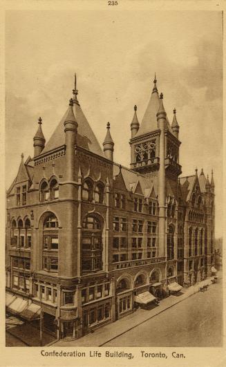 Sepia toned photograph of a huge Richardsonian Romanesque building.