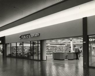 Picture of exterior of storefront library branch. 