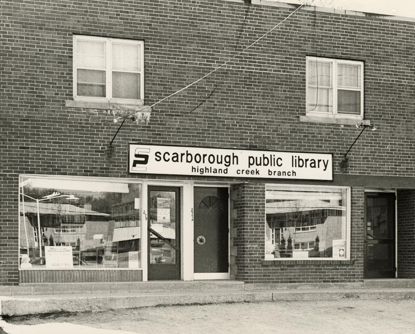 Picture of exterior of storefront library branch. 