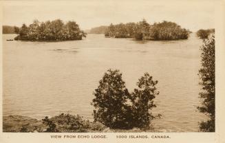 Sepia toned photograph of islands in the middle of a wide river. 