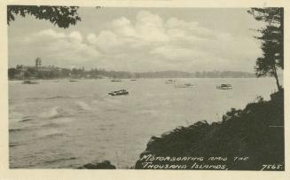 Sepia toned picture of a view of a waterway filled with motorboats, taken from the shoreline. R…