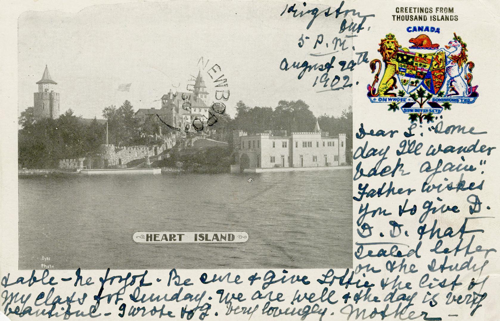 Black and white picture of a large, castle-like structure on the edge of a river.