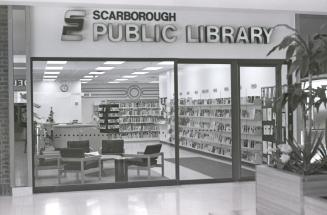 Picture of the outside of a library branch in a mall. 