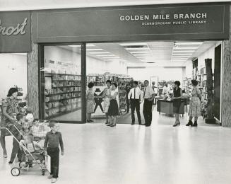 Picture of the front of a library branch inside a mall. 