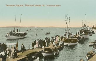 Colorized photograph of crowds of people and sail boats on and beside a wooden dock in a body o…