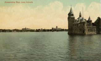 Colorized photograph of a body of water with a castle structure jutting out at the right hand s…