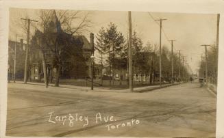 Sepia-toned postcard depicting the intersection of Langley and Broadview Avenues with the capti…