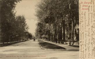 Black and white photograph of a horse and buggy running along a wide city street. Large trees a…