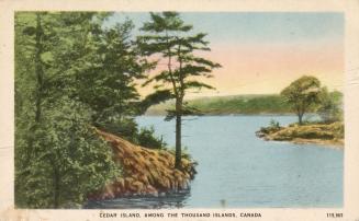 Islands in the middle of a large body of water, taken from a shoreline,