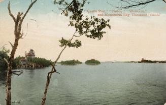 Islands with houses on them in the middle of a large body of water.