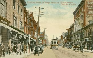 Colour postcard depicting a view of Yonge Street with a streetcar, car, horse-drawn wagons, a m…