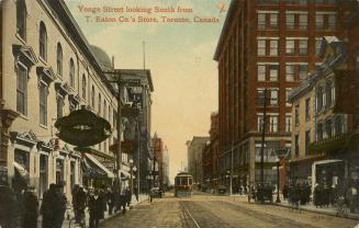 Colour postcard depicting a view of Yonge Street with a streetcar, many shops, and pedestrians …