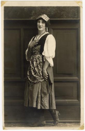 Black and white photograph of Allan Murray of the Dumbells in costume as Marie