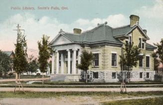 Picture of library building with six pillars at front entrance. 