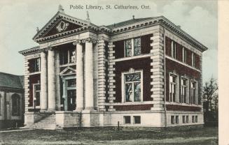 Picture of two storey library building with front pillars and portico. 