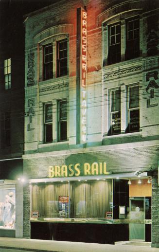 Colour photo postcard depicting the exterior frontage of a restaurant with big windows, with cu…