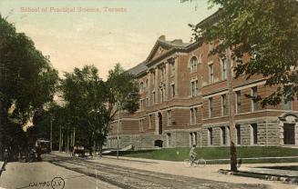 Colour postcard depicting the exterior frontage of a building, looking east at the building fro…