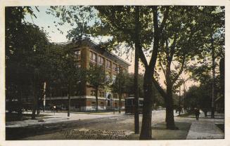 Colour postcard depicting the exterior view of a building, viewed from the south west corner of…