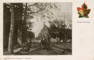 Black and white photograph of a horse and buggy on a city street with a large, Victorian buildi…