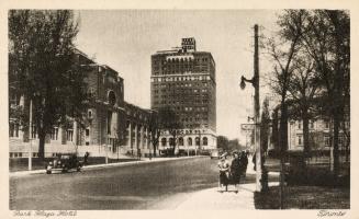 Black and white photo postcard depicting a view looking north up Avenue Road with the Royal Ont…