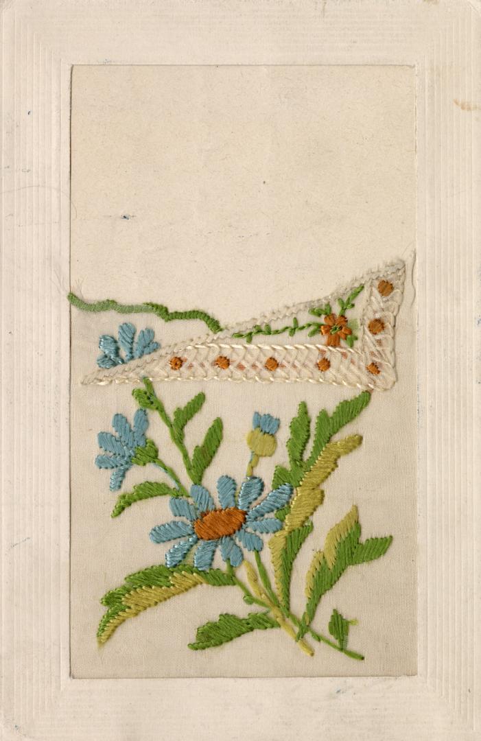 Silk embroidery of a steam of blue flowers.