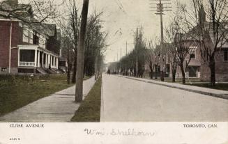 Colour photo postcard depicting a view up Close Avenue in Parkdale with homes, trees, and woode…