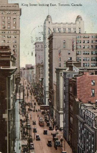 Colour postcard depicting a view of King Street with cars, pedestrians, and streetcars about. T…