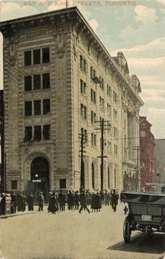 Colour photo postcard of Bay Street looking south, with The Bank of Commerce building, pedestri…