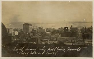 Black and white photo postcard depicting an aerial view of Toronto showing Lake Ontario in the …