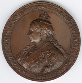 Bronze medal.(obverse) Crowned bust of Queen Victoria, left within a border of roses, shamrocks…