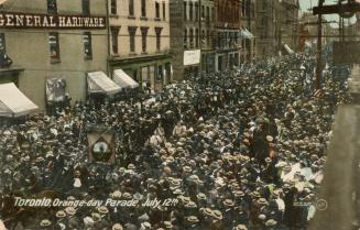 Colour postcard depicting large masses of people crowded on the streets of Toronto. A shop in t…