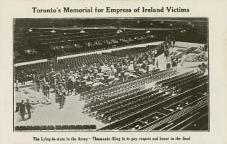 Black and white postcard depicting an inset photo of a large funeral service taking place in at…