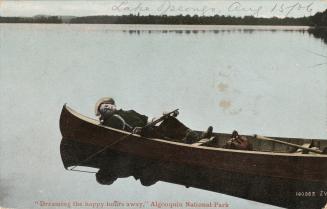 Colorized photograph of a man asleep in a drifting canoe.