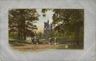 Colorized photograph of an open gate in an iron rail fence. In the background are large, colleg ...