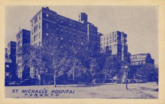 Black and white photograph of a multi-story public building.